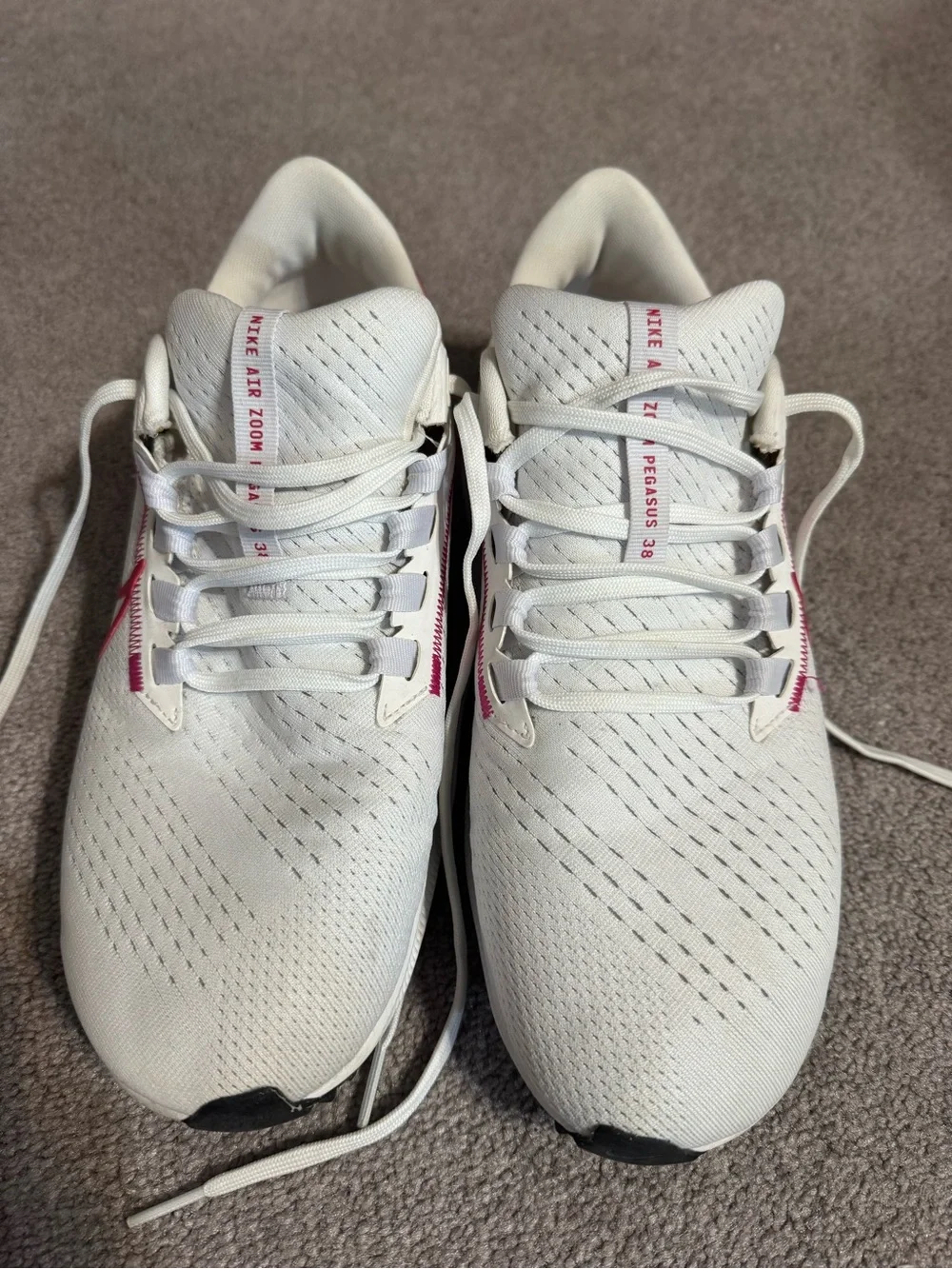 Nike Women's White Running Shoes with Pink Accents
